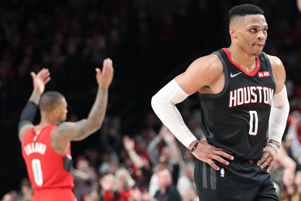 Damian Lillard and Russell Westbrook have a longstanding on-court feud. (Abbie Parr/Getty Images)