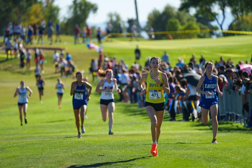 The division 1 girls finish at the AIA Cross Country Championships at Cave Creek Golf Course on Nov. 12, 2022 in Phoenix, AZ.