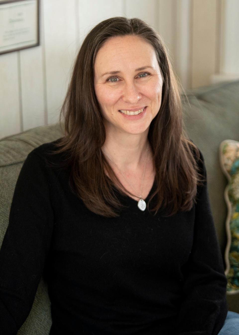 Linda Hogoboom poses for a photo in her Boonton home on Friday March 5, 2021. Hogoboom urged her local leaders in Boonton to implement gender-inclusive language. Specifically, she wanted the town's Board of Aldermen to become the Town Council. After eight months she was able to achieve her goal. 