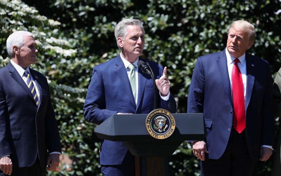 PHOTO: FILE - U.S. House Minority Leader Kevin McCarthy, speaks while U.S. President Donald Trump and U.S. Vice President Mike Pence listen during an event at the White House in Washington, D.C., Wednesday, April 22, 2020. (Bloomberg via Getty Images, FILE)