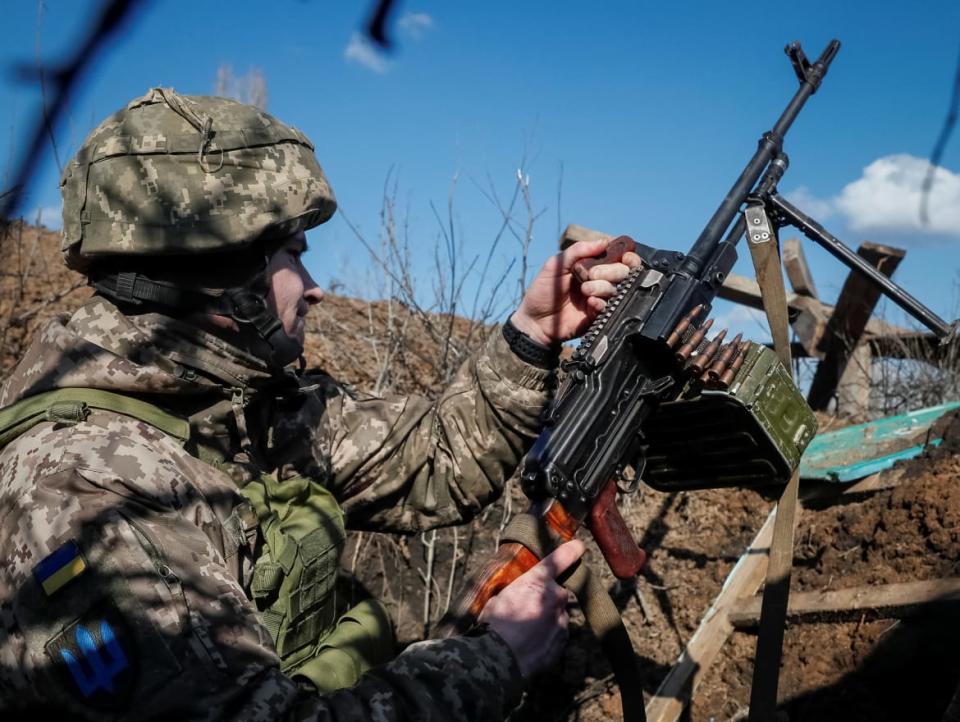 <div class="inline-image__title">UKRAINE-CRISIS/EAST-FRONTLINE</div> <div class="inline-image__caption"><p>A Ukrainian service member on the front line near the village of Travneve in Donetsk region, Ukraine.</p></div> <div class="inline-image__credit">GLEB GARANICH/REUTERS</div>