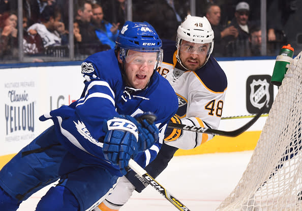 TORONTO, ON - JANUARY 17: Morgan Rielly #44 of the Toronto Maple Leafs skates against William Carrier #48 of the Buffalo Sabres during the first period at the Air Canada Centre on January 17, 2017 in Toronto, Ontario, Canada. (Photo by Graig Abel/NHLI via Getty Images)