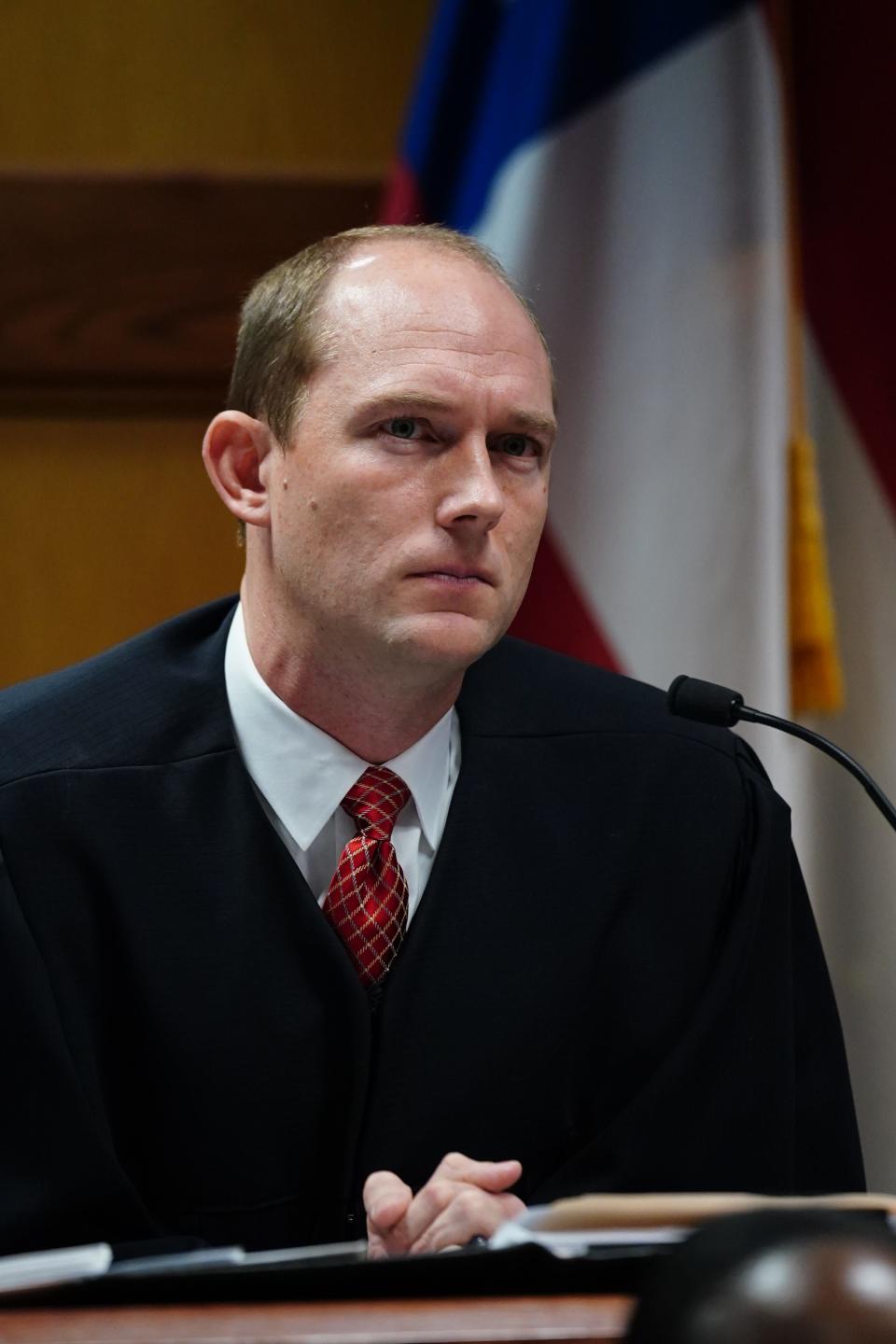 Fulton Superior Court Judge Scott McAfee is seen on the bench during a plea by Jenna Ellis at the Fulton County Courthouse, Tuesday, Oct. 24, 2023, in Atlanta. Ellis, an attorney and prominent conservative media figure, reached a deal with prosecutors Tuesday, Oct. 24, 2023, and pleaded guilty to a reduced charge over efforts to overturn Donald Trump’s 2020 election loss in Georgia.