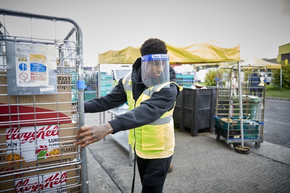 England football star Marcus Rashford led a campaign for free school meal vouchers in the pandemic (Fareshare/Mark Waugh/PA) (PA Media)