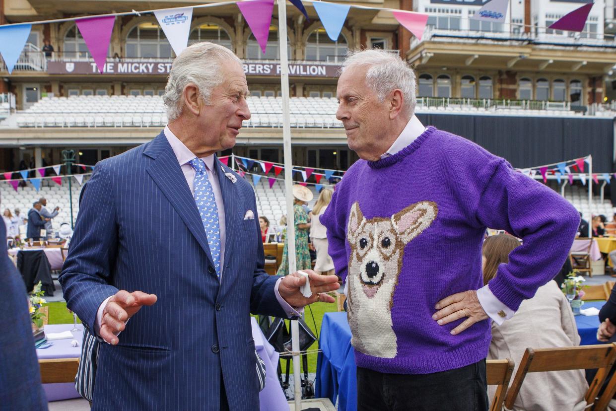 Britain's Prince Charles, left, as Patron of the Big Lunch, attends a Big Jubilee Lunch at The Oval, Kennington, in London, Sunday, June 5, 2022.