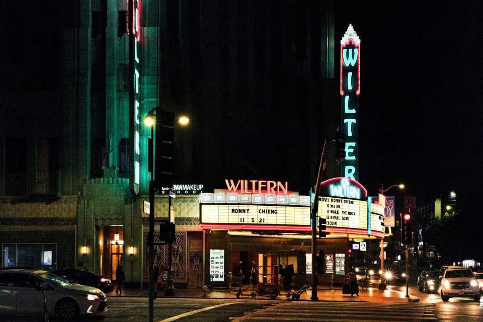 Nighttime view of the neon signs at The Wiltern Theatre in Los Angeles