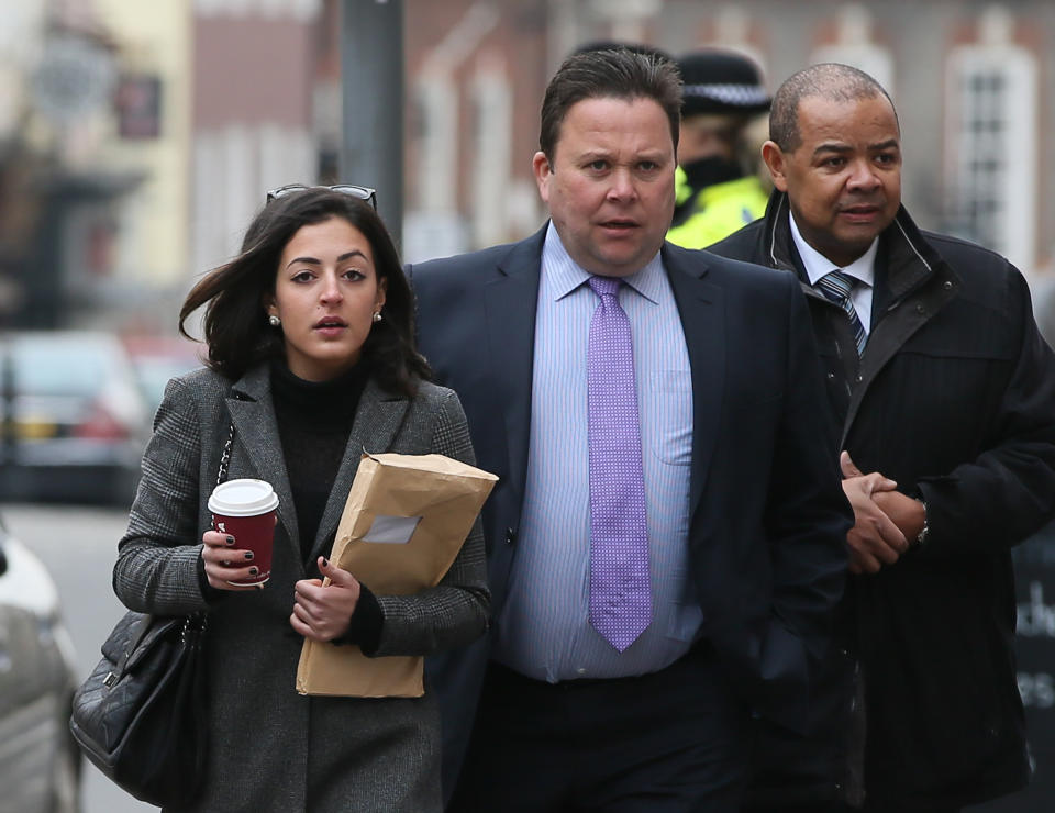 CAPTION CORRECTS THE SURNAME OF THE DAUGHTER TO BEREZOVSKAYA Russian oligarch Boris Berezovsky's daughter Anastasia, left, arrives for the second day of the inquest into his death at Windsor Coroner's Court, in Windsor, England, Thursday, March, 27, 2014. One of his daughters, Elizaveta Berezovskaya is due to appear as a witness on the second day of the hearing into the death of the tycoon. He was found dead at his former wife's property, in March 2013. (AP Photo/Alastair Grant)