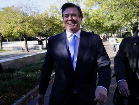 U.S. President Donald Trump's former campaign manager Paul Manafort departs U.S. District Court after a hearing in the first charges stemming from a special counsel investigation of possible Russian meddling in the 2016 presidential election in Washington, U.S., October 30, 2017. REUTERS/Jim Bourg