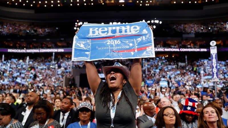 Delegates cheer as former Democratic Presidential candidate, Sen. Bernie Sanders, I-Vt., speaks during the first day of the Democratic National Convention in Philadelphia , Monday, July 25, 2016. A new report from Pew Research Center looked at how party affiliation has changed from the 1990s to the present.