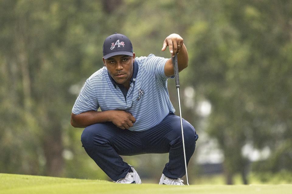 Harold Varner III of 4Aces GC lines up a putt on the fourth hole during the second round of LIV Golf Hong Kong at the Hong Kong Golf Club in Hong Kong, on Saturday, March 9, 2024. (Chris Trotman/LIV Golf via AP)