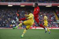 Britain Football Soccer - Liverpool v Crystal Palace - Premier League - Anfield - 23/4/17 Crystal Palace's Fraizer Campbell in action with Liverpool's Divock Origi Reuters / Phil Noble Livepic