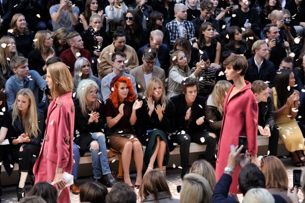 A shower of rose petals ends the Burberry Spring 2014 fashion show.