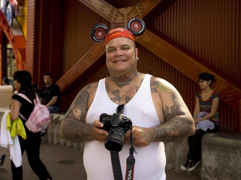 A Disneyland parkgoer wears a "Cars"-themed Mickey cap on April 18, 2010.