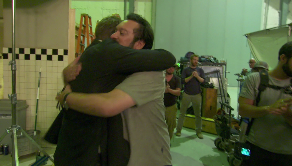 Hugh Jackman and James Mangold share a touching moment (20th Century Fox)