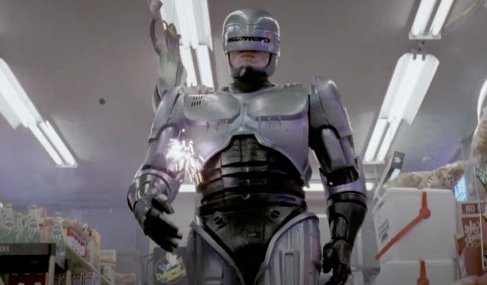 RoboCop walking as he's being shot