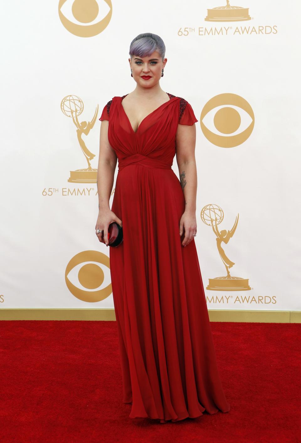 Television personality Kelly Osborne arrives at the 65th Primetime Emmy Awards in Los Angeles September 22, 2013. REUTERS/Mario Anzuoni (UNITED STATES Tags: ENTERTAINMENT) (EMMYS-ARRIVALS)