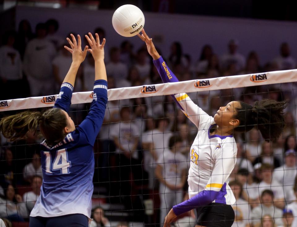 Taylorville's Robyn Odugbesan puts the ball over Nazareth Academy's Emily Risley during their Class 3A volleyball state semifinal Friday, Nov. 11, 2022 at CEFCU Arena in Normal.