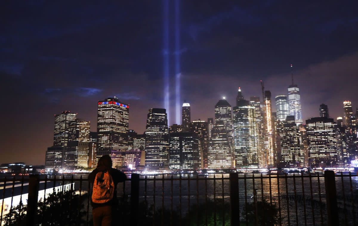 <p>(Photo by Spencer Platt/Getty Images)</p><p> The 'Tribute in Light' memorial lights up lower Manhattan near One World Trade Center on September 11, 2018. </p>