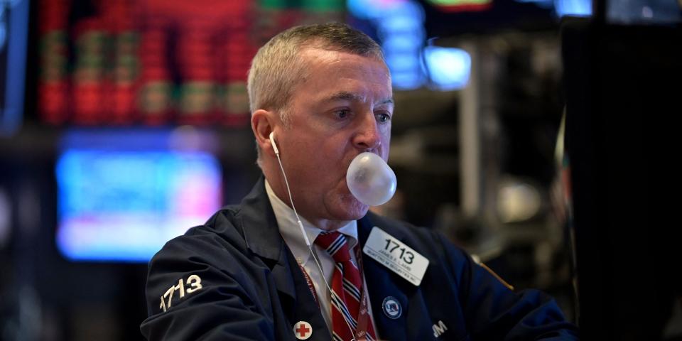 Image of a stock trader at the New York Stock Exchange.