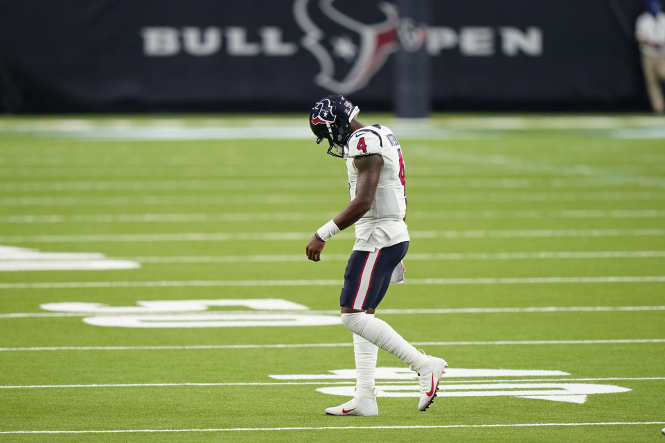 Houston Texans quarterback Deshaun Watson (4) walks off the field after failing to convert on a third down against the Baltimore Ravens during the second half of an NFL football game Sunday, Sept. 20, 2020, in Houston. (AP Photo/David J. Phillip)