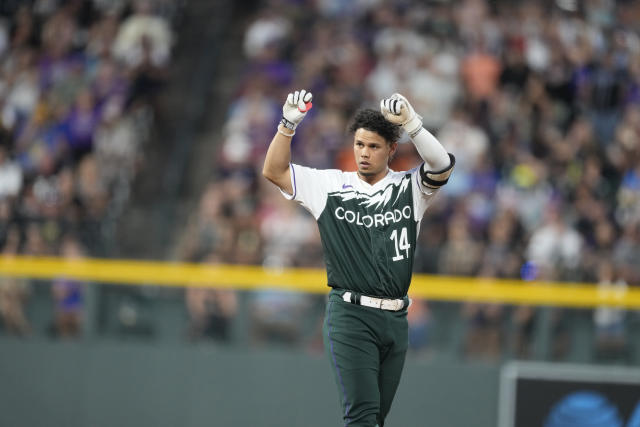 Doyle's 3-run triple, Blackmon's three RBIs lead Rockies to 8-7