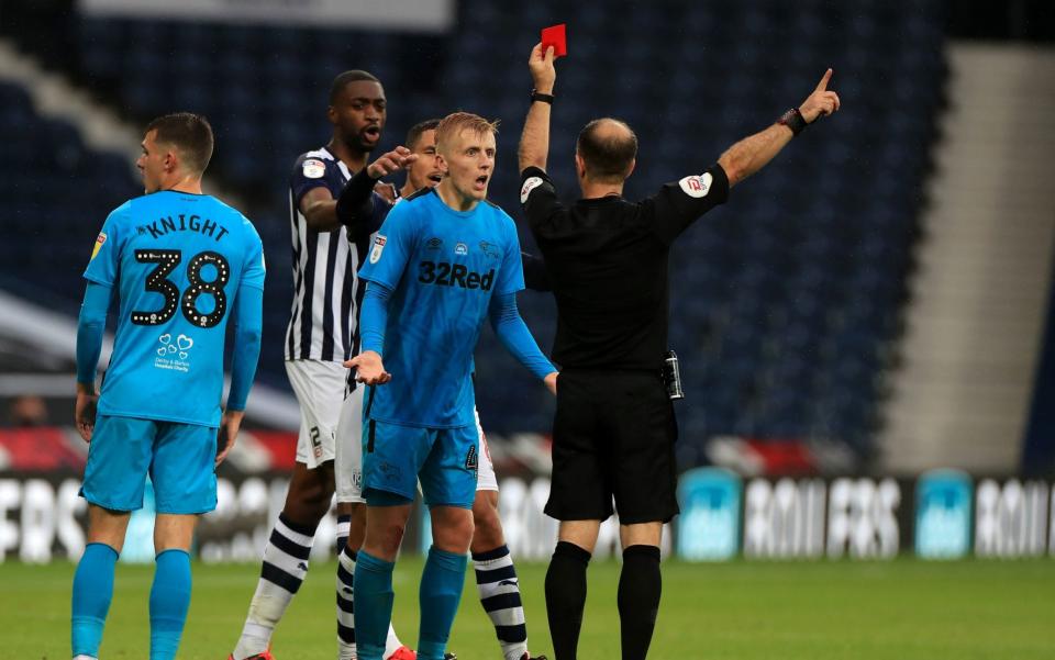Derby County's Louie Sibley is shown a red card by match referee Jeremy Simpson during the Sky Bet Championship match at The Hawthorns, West Bromwich. PA Photo. Issue date: Wednesday July 8, 2020 - PA
