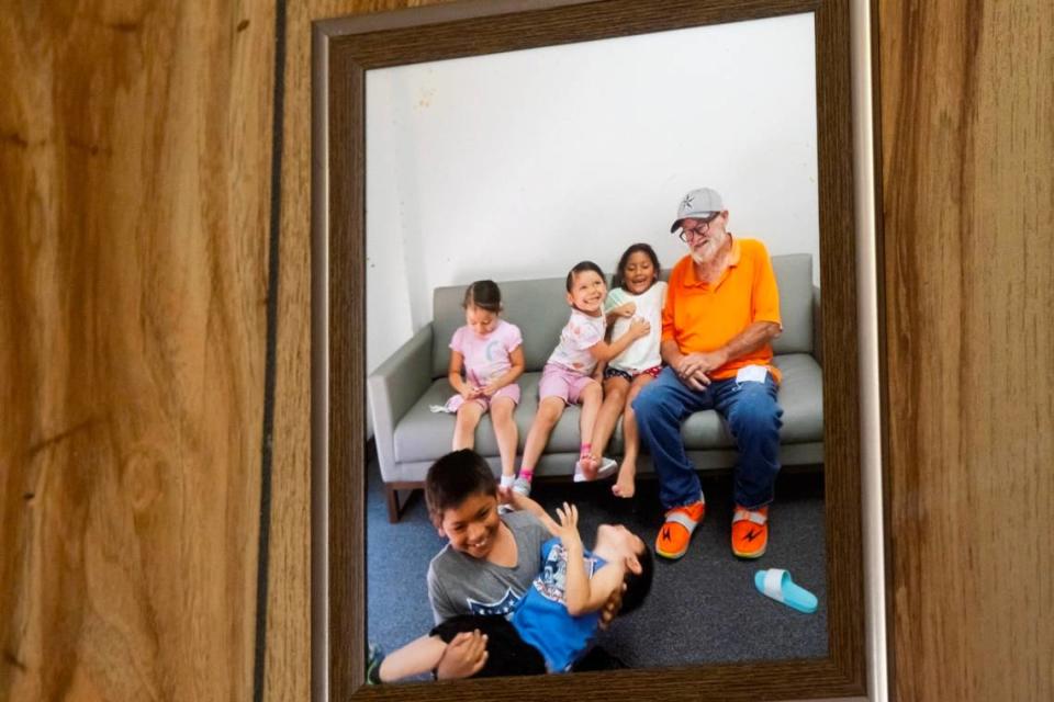 A photo inside Robert Parson’s home that shows him with Cindy Rodriguez-Singh’s children, including Noel Rodriguez-Alvarez in the blue shirt, in Everman, Texas, on March 28, 2023. Noel has not been seen since fall 2022, and police thoroughly searched the home during their investigation. Madeleine Cook/mcook@star-telegram.com