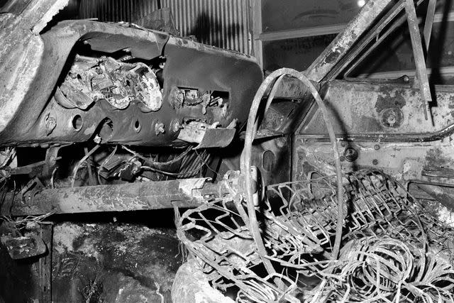 <p>FBI</p> The charred remains of the civil rights workers' Ford station wagon, the vehicle they were driving when Deputy Sheriff Cecil Price pulled them over June 21, 1964.