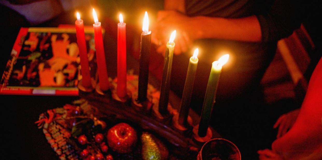 family celebrating kwanzaa, elevated view