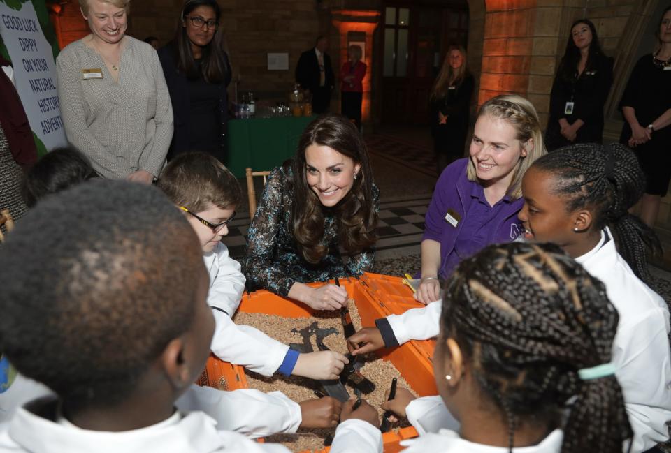 Kate Middleton talks to schoolchildren at the event. (Photo: Getty Images)