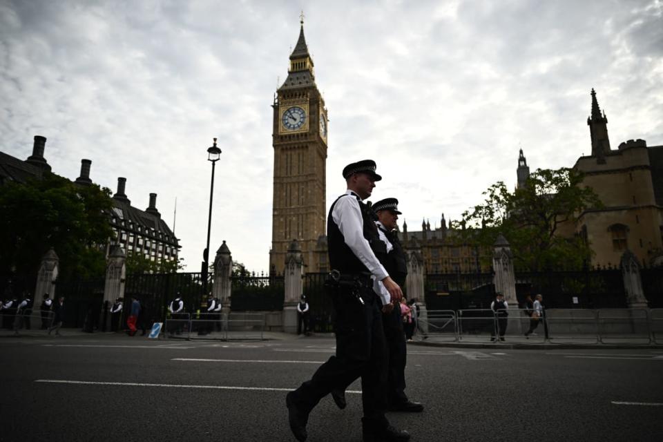 <div class="inline-image__caption"><p>London Metropolitan Police officers patrol at the Palace of Westminster, central London on September 12, 2022, following the death of Queen Elizabeth II on September 8. </p></div> <div class="inline-image__credit">MARCO BERTORELLO / Getty </div>