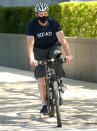 <p>Hugh Jackman takes his bike for a spin in New York City on Thursday.</p>