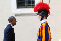 <p>President Barack Obama arrives at the San Damaso courtyard in front of a Swiss Guard for a meeting with Pope Francis on March 27, 2014 in Vatican City, Vatican. Obama is attending his first audience with Pope Francis which is also his second time being received at the Vatican, after an audience with Pope Benedict XVI on July 10, 2009. Barack Obama is the ninth US President to make an official visit to the Vatican. President Woodrow Wilson was the first US President who was received by Pope Benedict XV after the end of the First World War. (Franco Origlia/Getty Images) </p>