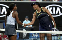 United States' Venus Williams, right, congratulates compatriot Cori "Coco" Gauff on winning their first round singles match at the Australian Open tennis championship in Melbourne, Australia, Monday, Jan. 20, 2020. (AP Photo/Dita Alangkara)