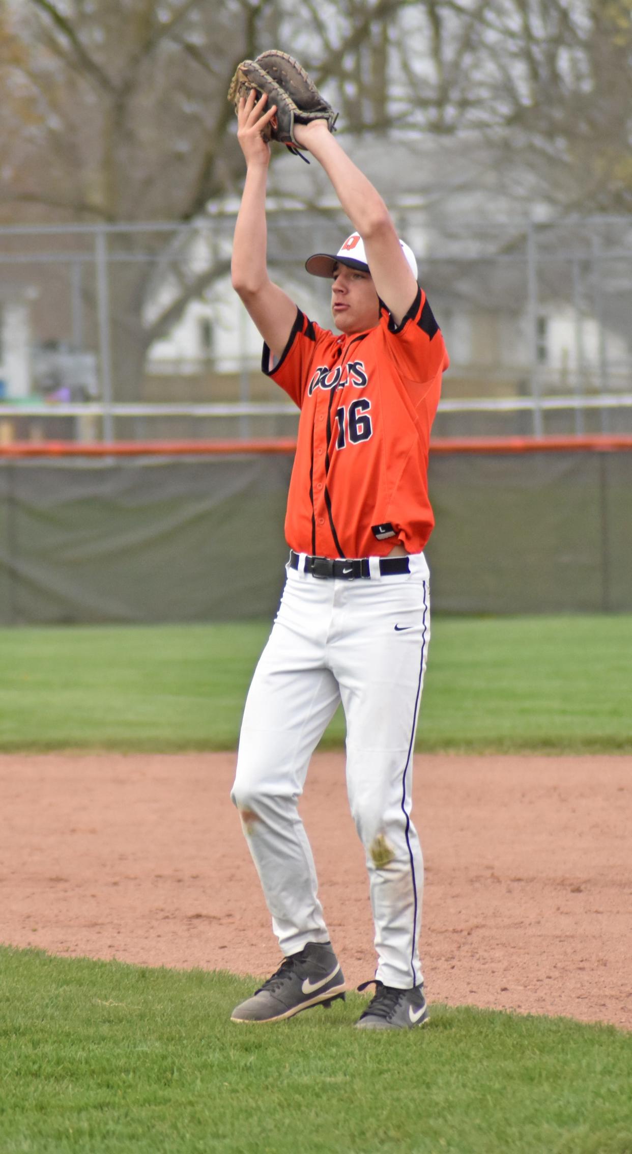 Quincy first baseman Alex Barry (16) hauls in a pop fly versus Concord on Tuesday