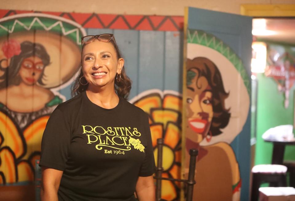 Rosita's Place owner MaryLou Medina stands in the banquet room in the back of her restaurant in Phoenix on Wednesday, July 19, 2023. The Medina family has owned Rosita's Place since 1964.
