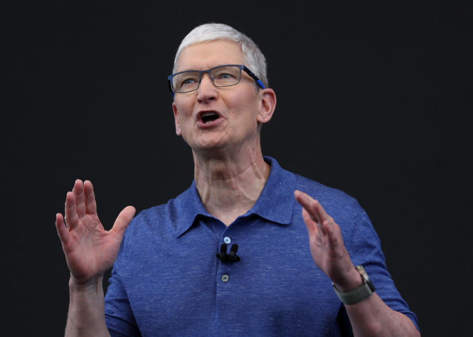 Apple CEO Tim Cook is betting that new AI features will ignite demand for the next generation of iPhones. <p>Justin Sullivan/Getty Images</p>