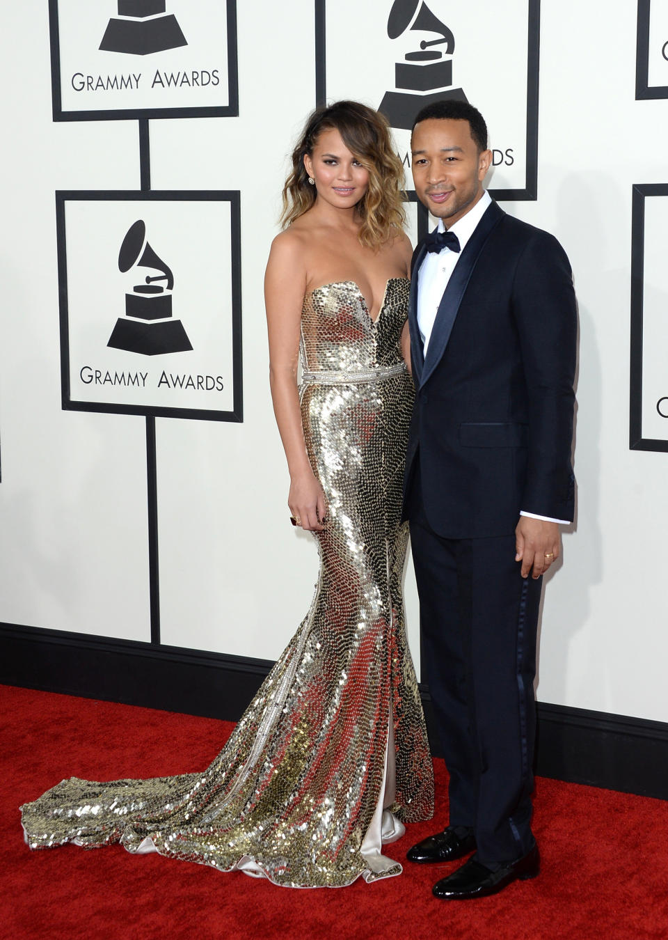 LOS ANGELES, CA - JANUARY 26:  Model Christine Teigen (L) and singer John Legend attend the 56th GRAMMY Awards at Staples Center on January 26, 2014 in Los Angeles, California.  (Photo by Jason Merritt/Getty Images)