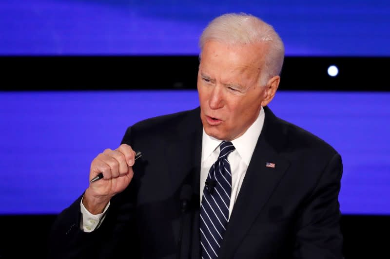 FILE PHOTO: Democratic 2020 U.S. presidential candidate former Vice President Joe Biden speaks at the seventh Democratic 2020 presidential debate at Drake University in Des Moines