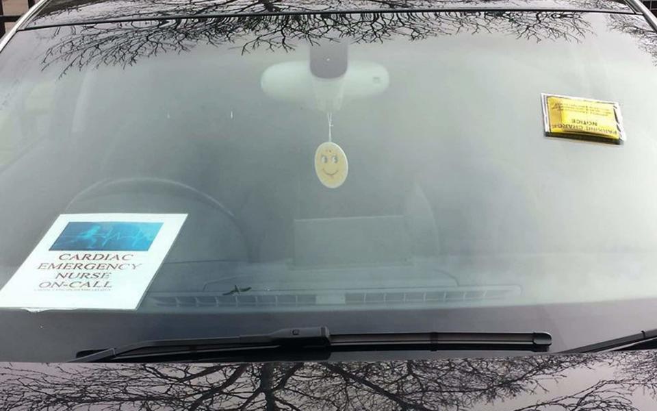 A car given a parking fine outside the University Hospital of Wales despite a sign stating “cardiac emergency nurse on call" displayed in the window  - Credit: South Wales Echo