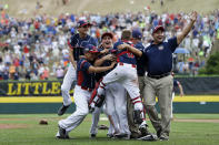 Endwell, N.Y., players and coaches celebrate after winning the Little League World Series Championship baseball game against South Korea, Sunday, Aug. 28, 2016, in South Williamsport, Pa. (AP Photo/Matt Slocum)