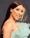 <p>Soft and sleek is the name of the game for comedian Robin Thede. Her hair was styled pin straight, while her long lashes upped the neutral glam. She finished off the look with a nude matte lip. </p>