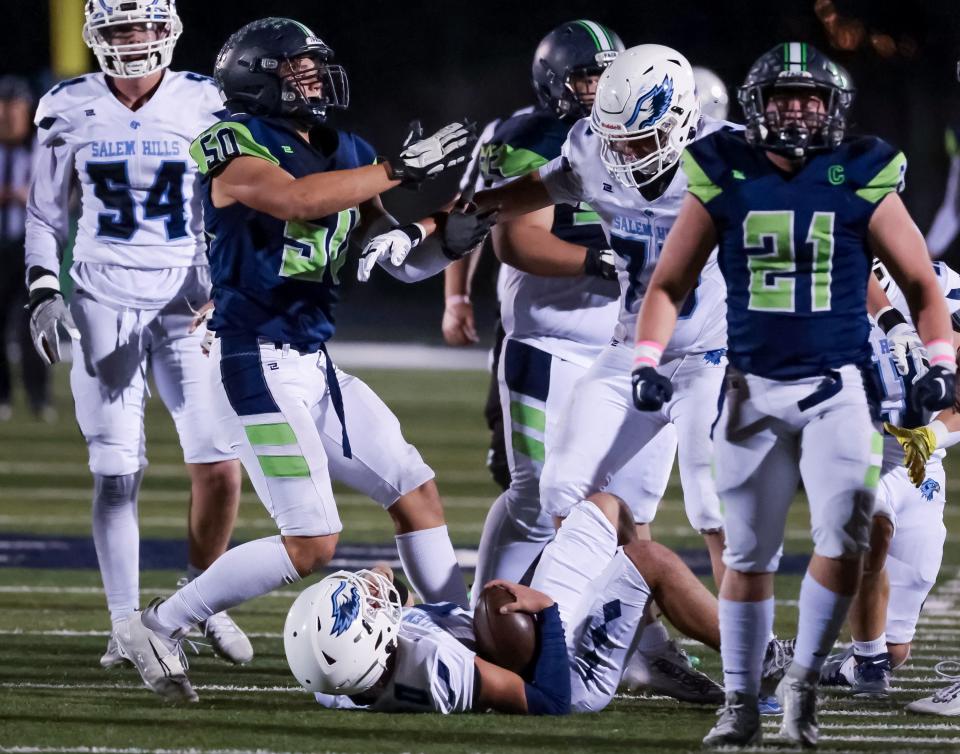 Timpanogos hosts Salem Hills in a high school football game in Orem on Friday, Oct. 6, 2023. | Spenser Heaps, Deseret News