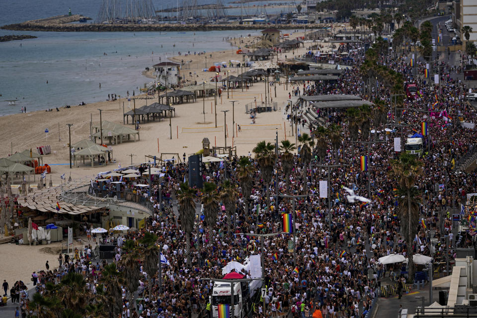 People participate in the annual Pride Parade in Tel Aviv, Israel, Thursday, June 8, 2023. (AP Photo/Ariel Schalit)