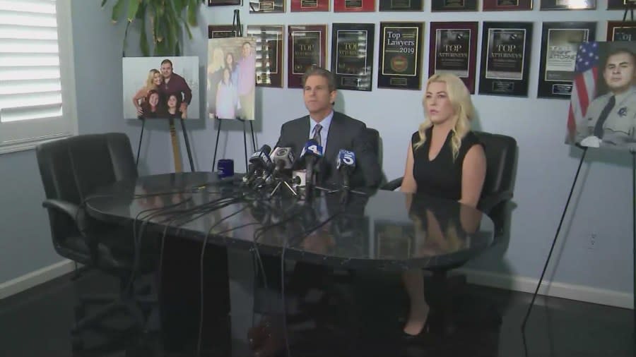 Michele Atilano and her attorney, Brad Gage, held a press conference on Dec. 8, 2023 announcing the filing of a claim against the department after her husband, an L.A. County deputy, died by suicide. (KTLA)