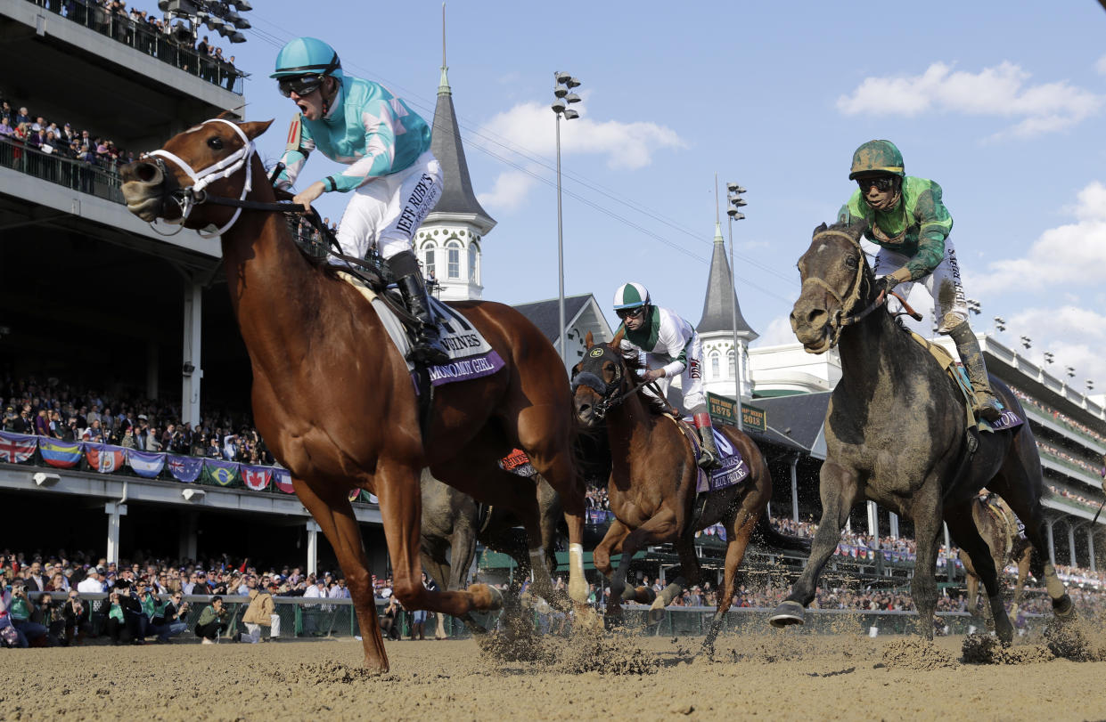 A drunk Kentucky man snuck into a restricted area at Churchill Downs on Saturday, hopped on a horse, and tried to ride it around the track. (AP Photo/Darron Cummings)