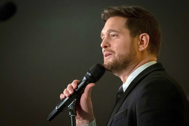 <p>Ethan Cairns/The Canadian Press via AP</p> Michael Bublé performs during the "One Year to Go" Invictus Games dinner