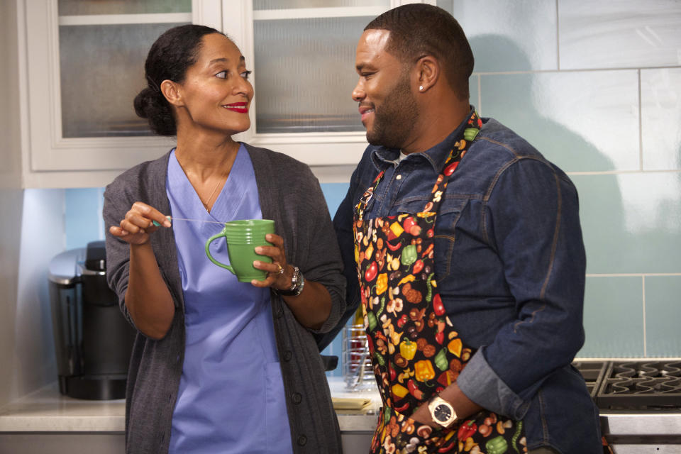 Tracee Ellis Ross as Rainbow and Anthony Anderson as Dre of "Black-ish" stand in their kitchen while filming the episode "Crazy Mom"