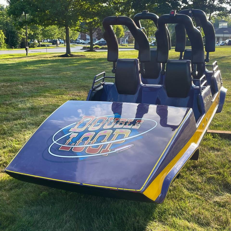 A coaster car from former Geauga Lake's Double Loop roller coaster is up for auction.