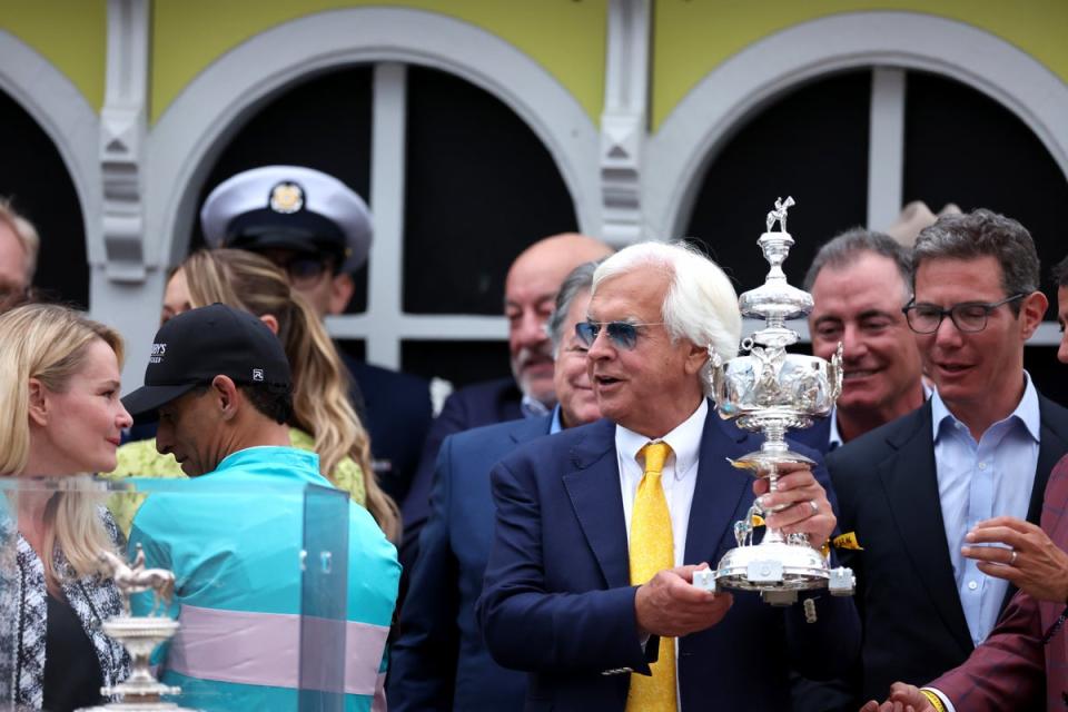 Bob Baffert celebrates after his horse National Treasure won the 148th running of the Preakness Stakes (Getty Images)